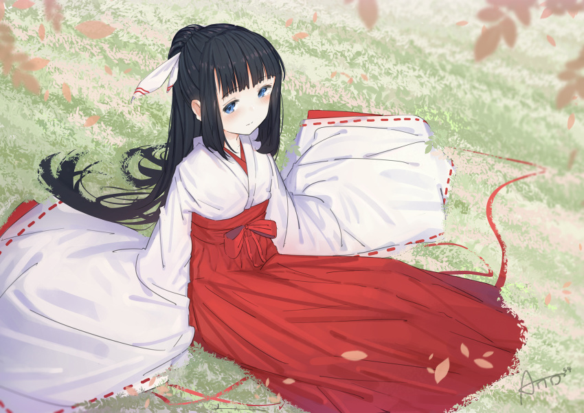 1girl ano54 bangs black_hair blue_eyes blurry blurry_foreground blush closed_mouth commentary day depth_of_field eyebrows_visible_through_hair grass hair_ribbon hakama highres japanese_clothes kimono long_hair long_sleeves miko on_grass original outdoors ponytail red_hakama ribbon ribbon-trimmed_sleeves ribbon_trim short_kimono sidelocks signature sitting sleeves_past_fingers sleeves_past_wrists smile solo very_long_hair white_kimono white_ribbon wide_sleeves