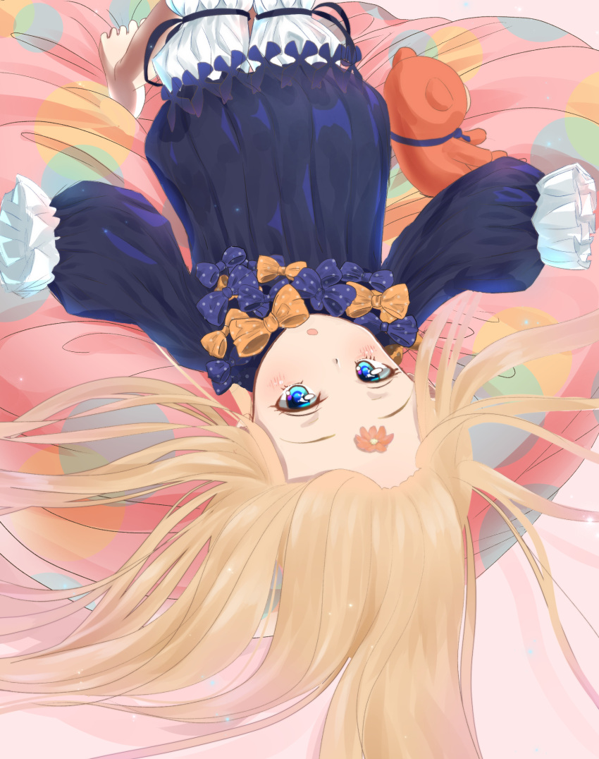 1girl abigail_williams_(fate/grand_order) bangs black_bow black_dress blonde_hair bloomers blue_eyes blush bow bug butterfly commentary_request dress fate/grand_order fate_(series) flower forehead hair_spread_out highres insect long_hair long_sleeves looking_at_viewer lying no_hat no_headwear on_back orange_bow orange_flower parted_bangs parted_lips polka_dot polka_dot_bow sakazakinchan sleeves_past_fingers sleeves_past_wrists solo stuffed_animal stuffed_toy teddy_bear underwear very_long_hair white_bloomers