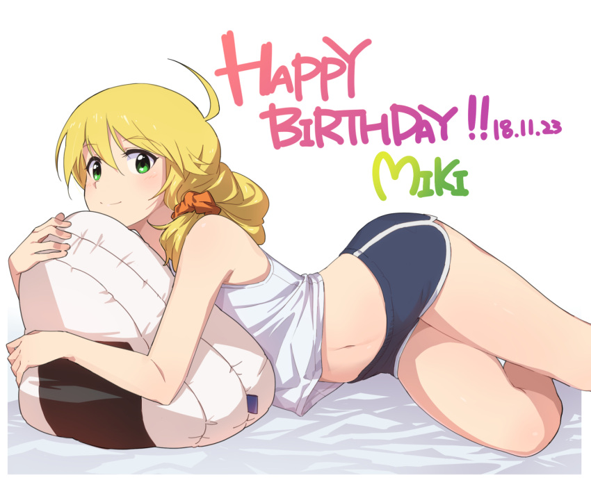 1girl bed_sheet blonde_hair blue_shorts character_name eyebrows_visible_through_hair food green_eyes gulim hair_between_eyes hair_ornament hair_over_shoulder hair_scrunchie happy_birthday highres hoshii_miki idolmaster idolmaster_(classic) long_hair looking_at_viewer lying midriff navel on_side onigiri orange_scrunchie pillow pillow_hug scrunchie shirt short_shorts shorts simple_background sleeveless sleeveless_shirt smile solo stomach white_background white_shirt