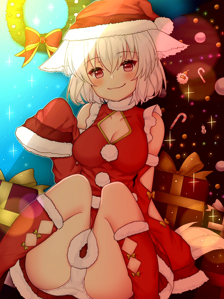 1girl absurdres animal_ears ayashiro blush box breasts christmas christmas_tree cleavage cleavage_cutout detached_sleeves fur_trim gift gift_box hat highres inubashiri_momiji looking_at_viewer medium_breasts panties pom_pom_(clothes) red_eyes santa_costume santa_hat short_hair silver_hair sitting smile solo tail touhou underwear white_panties wide_sleeves wolf_ears wolf_tail