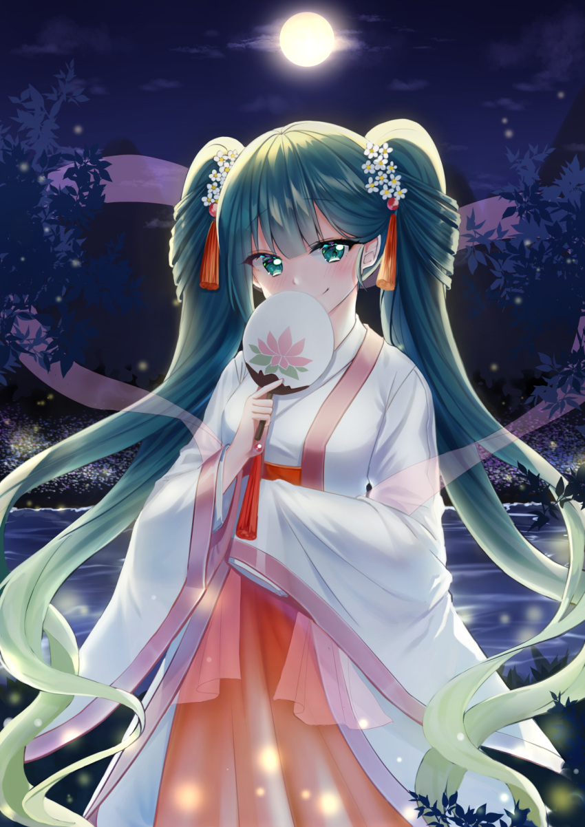 1girl bangs blush breasts closed_mouth clouds eyebrows_visible_through_hair fan fireflies flower full_moon green_eyes green_hair hair_between_eyes hair_flower hair_ornament hakama hatsune_miku head_tilt highres holding japanese_clothes lake long_hair long_sleeves mamel_27 miko moon night night_sky outdoors paper_fan red_hakama sky sleeves_past_fingers sleeves_past_wrists small_breasts smile solo twintails uchiwa very_long_hair vocaloid water white_flower wide_sleeves