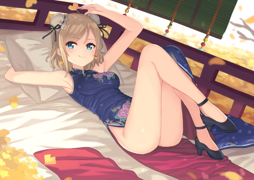 1girl arm_up armpits ass bangs bare_arms bare_shoulders bed_sheet black_footwear blue_dress blue_eyes blush breasts bun_cover china_dress chinese_clothes commentary_request double_bun dress dutch_angle earrings eyebrows_visible_through_hair ginkgo ginkgo_leaf hajime_kaname heart heart_earrings high_heels highres holding_legs jewelry knees_up light_brown_hair love_live! love_live!_sunshine!! lying medium_breasts on_back pelvic_curtain pillow shoes side_bun sleeveless sleeveless_dress solo thighs watanabe_you