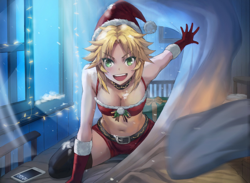 1girl bed black_legwear blanket blonde_hair blush breasts cellphone christmas christmas_lights cleavage collar commentary english_commentary fate/apocrypha fate_(series) gift gloves green_eyes hat looking_at_viewer medium_breasts mordred_(fate) mordred_(fate)_(all) navel night open_mouth open_window phone pillow santa_costume santa_hat shorts smartphone smile snow solo stomach thigh-highs tonee window