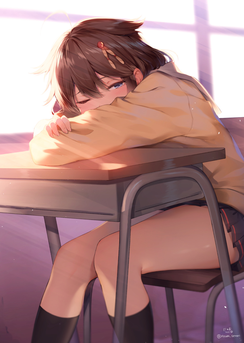 1girl absurdres ahoge bangs black_legwear black_skirt blue_eyes blush braid brown_hair classroom commentary_request covered_mouth desk hair_flaps hair_ornament hair_over_shoulder half-closed_eye head_on_table highres kantai_collection kneehighs knees_together_feet_apart light_particles long_hair looking_at_viewer nyum one_eye_closed pleated_skirt remodel_(kantai_collection) school_uniform serafuku shigure_(kantai_collection) sidelocks signature single_braid sitting skirt solo sunlight sunset sweater thighs twitter_username waking_up window yellow_sweater