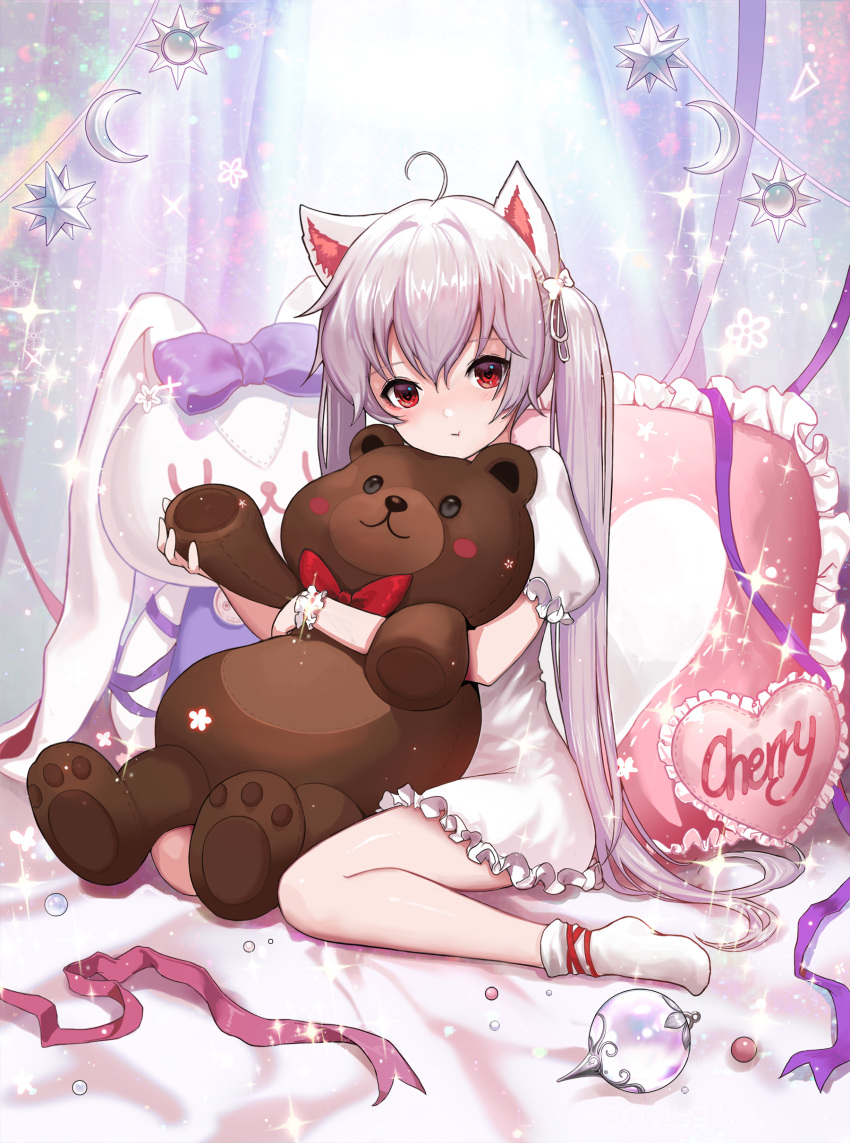 1girl :t absurdres ahoge animal_ears bangs bed_sheet bow cat_ears closed_mouth commentary_request crescent dress eyebrows_visible_through_hair frilled_pillow frills hair_between_eyes head_tilt heart heart-shaped_pupils highres long_hair no_shoes object_hug original ornament phonic pillow pink_bow pout puffy_short_sleeves puffy_sleeves red_eyes red_ribbon revision ribbon short_sleeves silver_hair sitting socks solo sparkle stuffed_animal stuffed_bunny stuffed_toy symbol-shaped_pupils teddy_bear twintails very_long_hair wariza white_dress white_legwear