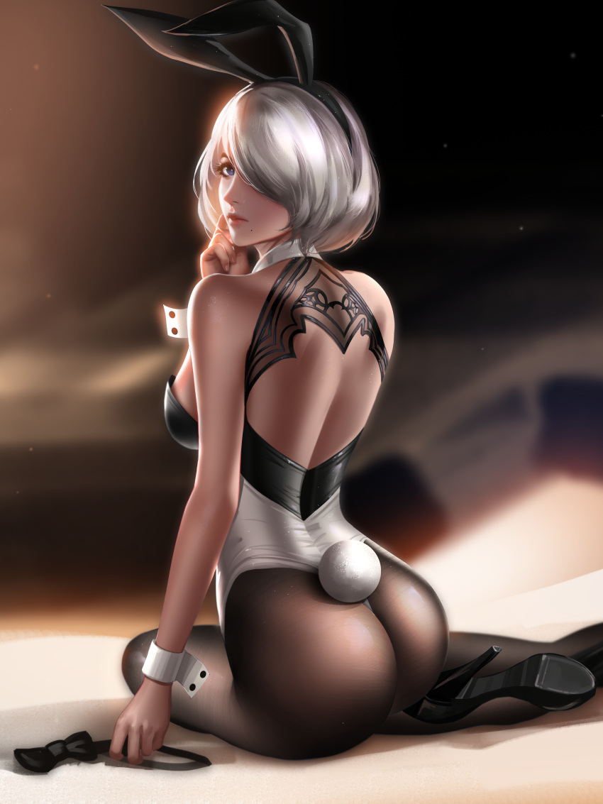 1girl absurdres animal_ears ass back_cutout breasts bunny_tail fake_animal_ears from_behind hair_over_one_eye high_heels highleg highleg_leotard highres leotard liang_xing looking_at_viewer looking_back medium_breasts mole mole_under_mouth nier_(series) nier_automata no_blindfold paid_reward pantyhose patreon_reward pink_lips rabbit_ears shiny shiny_hair short_hair silver_hair sitting solo tail white_leotard wrist_cuffs yorha_no._2_type_b