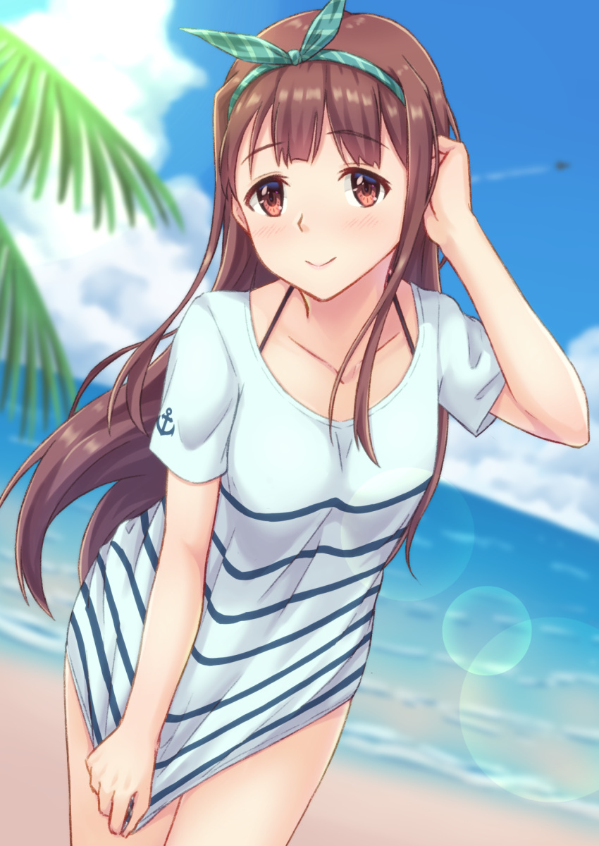 1girl anchor_print beach blue_sky blurry blurry_background bow brown_eyes brown_hair clouds cowboy_shot day dutch_angle eyebrows_visible_through_hair floating_hair hair_bow hairband highres idolmaster idolmaster_million_live! lens_flare long_hair looking_at_viewer ocean shirt shirt_tug short_sleeves sky smile solo soujin standing striped striped_bow striped_hairband striped_shirt tanaka_kotoha very_long_hair white_shirt