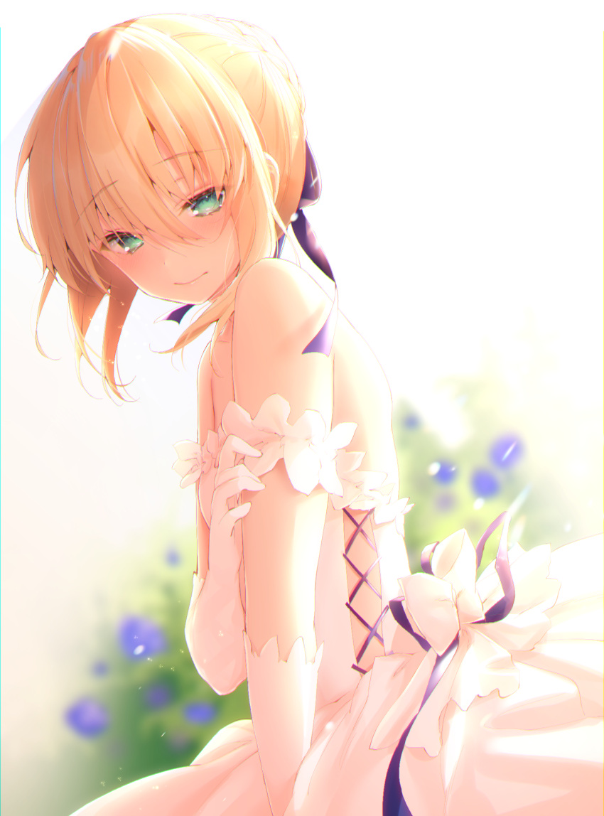 1girl artoria_pendragon_(all) backlighting bangs bare_shoulders blonde_hair blue_bow blue_flower blurry blurry_background blush bow braid commentary_request depth_of_field dress elbow_gloves eyebrows_visible_through_hair fate/stay_night fate_(series) flower gloves green_eyes hair_between_eyes hair_bow hair_bun highres jiiwara looking_at_viewer looking_to_the_side saber solo strapless strapless_dress white_bow white_dress white_gloves