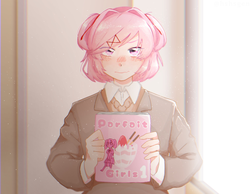 1girl blush collared_shirt commentary doki_doki_literature_club dust_particles eyes_visible_through_hair fang grey_jacket hair_ornament hair_ribbon hairclip holding hshsgen indoors jacket long_sleeves looking_at_viewer manga_(object) natsuki_(doki_doki_literature_club) nose_blush pink_eyes pink_hair red_ribbon ribbon school_uniform shirt short_hair sidelighting solo two_side_up upper_body white_shirt wing_collar
