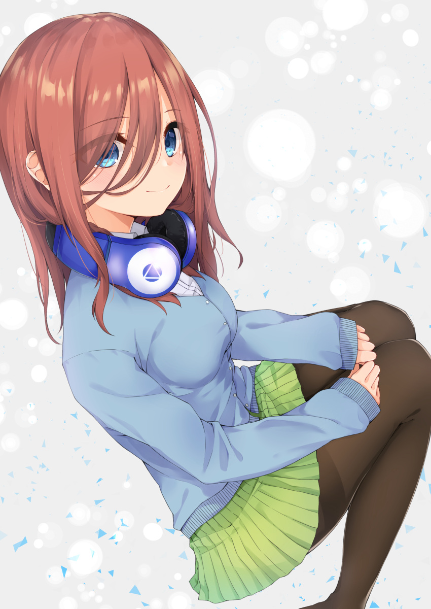 1girl absurdres bangs blue_cardigan blue_eyes breasts brown_hair cardigan closed_mouth commentary_request eyebrows_visible_through_hair feet_out_of_frame go-toubun_no_hanayome green_skirt hair_between_eyes headphones headphones_around_neck highres hijouguti legs long_hair long_sleeves looking_at_viewer medium_breasts nakano_miku pantyhose school_uniform seiza shiny shiny_hair shirt sitting skirt smile solo thighs white_shirt