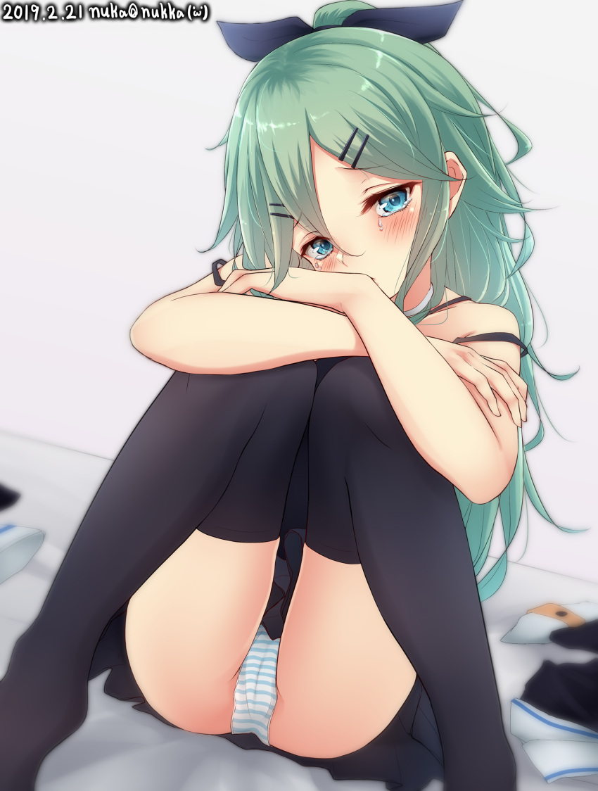 1girl aqua_eyes black_legwear black_skirt crying crying_with_eyes_open green_hair hair_between_eyes hair_ornament hair_ribbon hairclip highres kantai_collection long_hair looking_at_viewer nuka_(nvkka) panties pantyshot pleated_skirt ponytail ribbon skirt solo striped striped_panties tears thigh-highs underwear yamakaze_(kantai_collection)