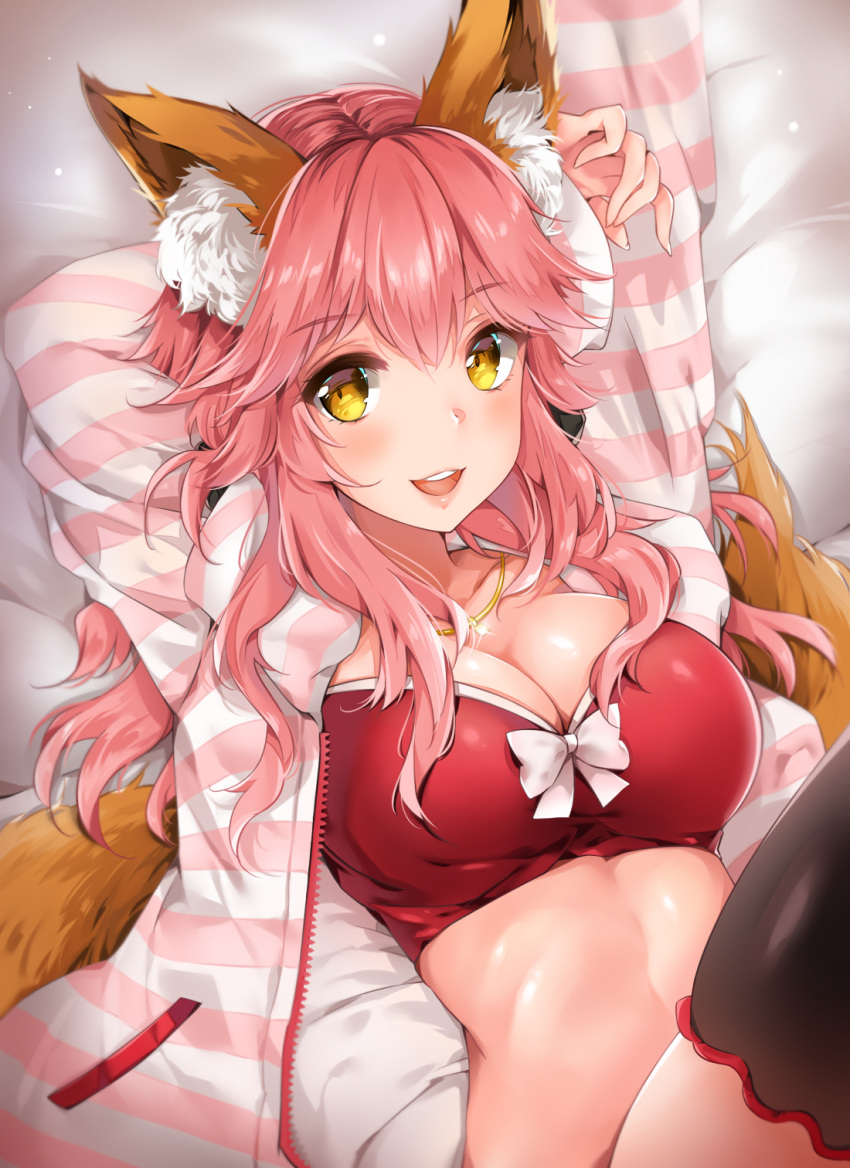 1girl animal_ear_fluff animal_ears arms_up bangs black_legwear blush bra breasts cleavage fate/extra fate/extra_ccc fate_(series) fox_ears fox_tail hair_between_eyes highres jacket large_breasts long_hair long_sleeves looking_at_viewer lying nia_(leafunia) on_back open_clothes open_jacket open_mouth pink_hair pink_jacket red_bra sidelocks smile solo striped_jacket tail tamamo_(fate)_(all) tamamo_no_mae_(fate) thigh-highs underwear yellow_eyes