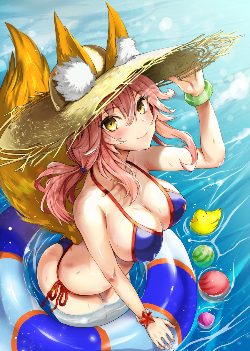 1girl absurdres animal_ear_fluff animal_ears ass bikini blue_bikini breasts cleavage closed_mouth ears_through_headwear fantia_reward fate/grand_order fate_(series) fox_ears fox_girl fox_tail hat highres innertube kojima_saya large_breasts long_hair looking_at_viewer paid_reward partially_submerged pink_hair rubber_duck shiny shiny_hair shiny_skin side-tie_bikini smile solo straw_hat sun_hat swimsuit tail tamamo_(fate)_(all) tamamo_no_mae_(swimsuit_lancer)_(fate) wet yellow_eyes