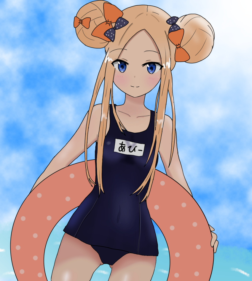1girl abigail_williams_(fate/grand_order) atsumisu bangs bare_arms bare_shoulders black_bow blonde_hair blue_eyes blue_sky blue_swimsuit blush bow breasts closed_mouth clouds cloudy_sky collarbone commentary_request covered_navel cowboy_shot day double_bun dutch_angle eyebrows_visible_through_hair fate/grand_order fate_(series) forehead gluteal_fold hair_bow highres innertube long_hair name_tag old_school_swimsuit one-piece_swimsuit orange_bow outdoors parted_bangs polka_dot polka_dot_bow school_swimsuit side_bun sidelocks sky small_breasts smile solo swimsuit