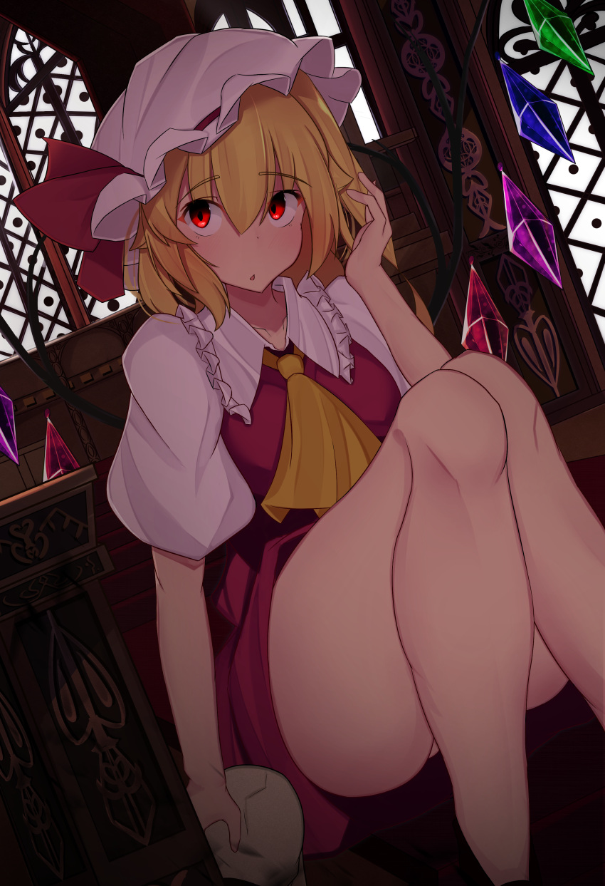 1girl absurdres ass bare_legs blonde_hair blush commentary_request crystal enami_(puusannnemuiyo) flandre_scarlet hat hat_ribbon highres indoors knees_up looking_at_viewer mob_cap open_mouth puffy_short_sleeves puffy_sleeves red_eyes red_ribbon red_skirt red_vest ribbon shirt short_sleeves side_ponytail sitting skirt skull solo thighs touhou vampire vest white_shirt wings yellow_neckwear