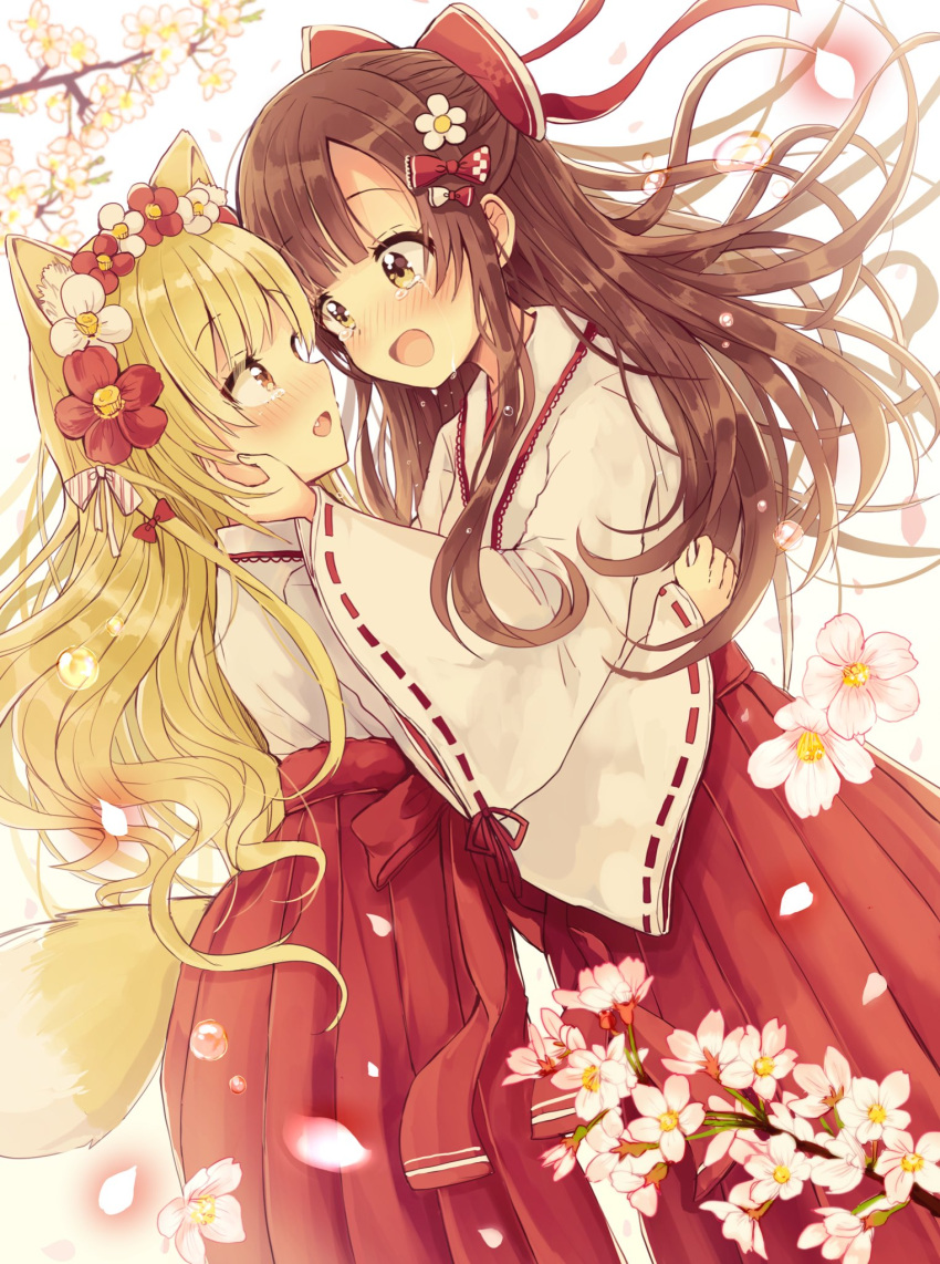 2girls animal_ear_fluff animal_ears bangs blonde_hair blurry blurry_background bow brown_eyes brown_hair commentary_request crying crying_with_eyes_open depth_of_field eye_contact eyebrows_visible_through_hair fang fingernails flower hair_between_eyes hair_bow hair_flower hair_ornament hakama hand_on_another's_face highres japanese_clothes kimono long_hair long_sleeves looking_at_another multiple_girls open_mouth original petals red_bow red_flower red_hakama ribbon-trimmed_sleeves ribbon_trim sakura_oriko tail tears tree_branch very_long_hair white_background white_bow white_flower white_kimono wide_sleeves