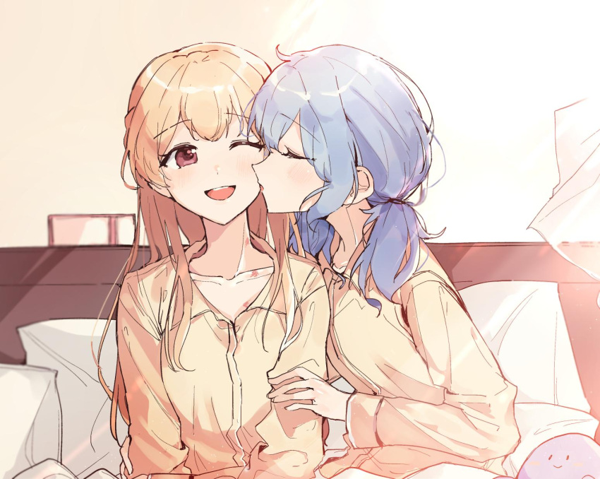 2girls ;d alternate_hairstyle aqua_hair bang_dream! bangs bed blonde_hair cheek_kiss closed_eyes collarbone commentary_request eyebrows_visible_through_hair hanazono_suki hand_on_another's_arm highres indoors kiss long_hair long_sleeves matsubara_kanon messy_hair multiple_girls one_eye_closed open_mouth pajamas pillow red_eyes shirasagi_chisato sitting smile stuffed_toy twintails under_covers violet_eyes yellow_pajamas yuri