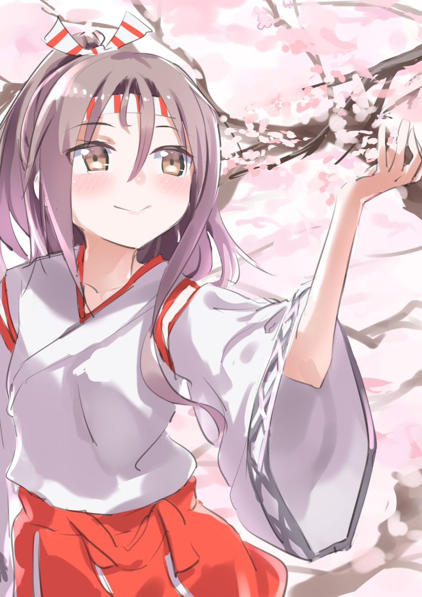 1girl brown_eyes cherry_blossoms closed_mouth commentary_request cowboy_shot flower gedoo_(gedo) hachimaki hair_between_eyes hakama headband high_ponytail highres japanese_clothes kantai_collection light_brown_hair long_hair ponytail red_hakama smile solo zuihou_(kantai_collection)