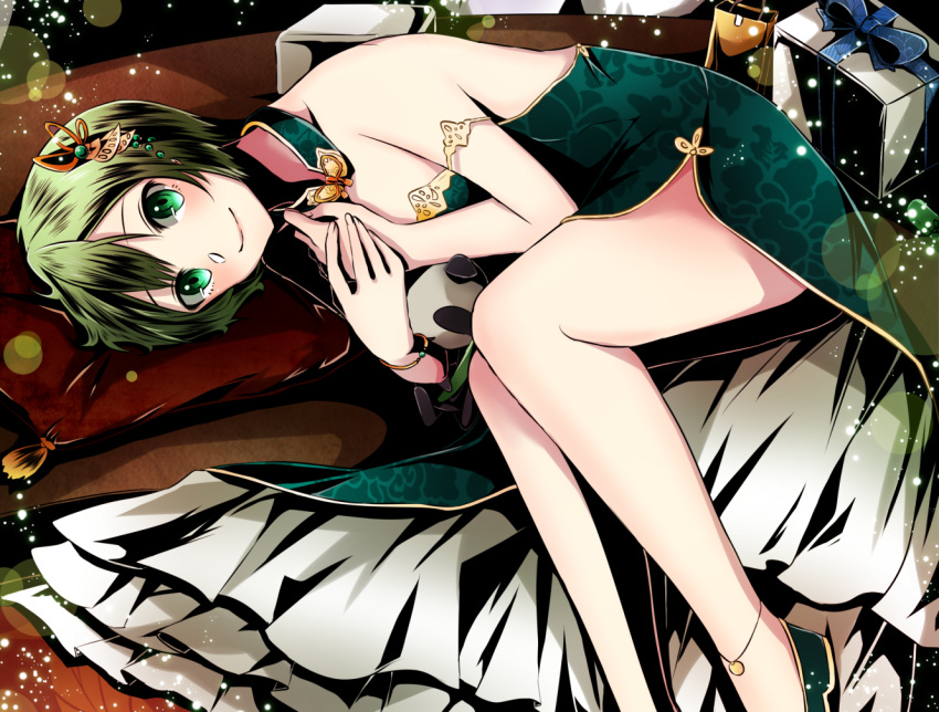 1girl anklet box divine_gate dress floral_print getsuyoubi gift gift_box green_dress green_eyes green_hair hair_between_eyes hair_ornament jewelry layered_dress looking_at_viewer lying on_side print_dress short_hair side_slit sleeveless sleeveless_dress smile solo strapless strapless_dress