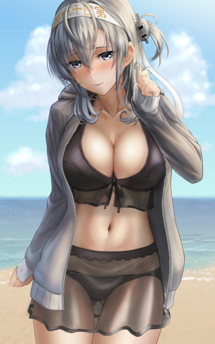 1girl beach bikini black_bikini blue_eyes blue_sky blush breasts cleavage clothes_writing clouds cowboy_shot day gluteal_fold hachimaki hair_between_eyes hand_up headband highres jacket kantai_collection kokuzoo long_hair looking_at_viewer navel ocean one_side_up open_clothes open_jacket outdoors sand see-through silver_hair sky solo stomach suzutsuki_(kantai_collection) swimsuit unzipped