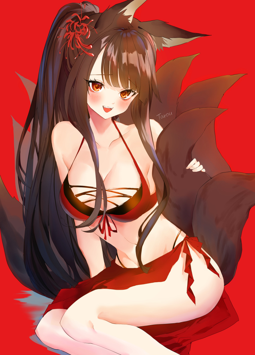 1girl absurdres akagi_(azur_lane) alternate_costume animal_ears artist_name azur_lane bangs bikini blunt_bangs breasts brown_hair cleavage collarbone fangs flower fox_ears fox_tail hair_flower hair_ornament highres hoerutarou kitsune large_breasts long_hair long_ponytail looking_at_viewer multiple_tails navel open_mouth red_background red_bikini red_eyes red_sarong sarong sidelocks simple_background sitting smile solo swimsuit tail tail_hug yellow_eyes