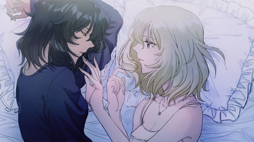 2girls andou_(girls_und_panzer) april_tada arm_up bangs bed_sheet black_hair black_shirt blonde_hair blue_eyes closed_eyes commentary dark_skin eyebrows_visible_through_hair girls_und_panzer highres jewelry light_frown light_particles long_sleeves looking_at_another lying medium_hair messy_hair multiple_girls necklace nightgown on_bed on_side oshida_(girls_und_panzer) parted_lips pillow shirt sleeping spaghetti_strap yuri
