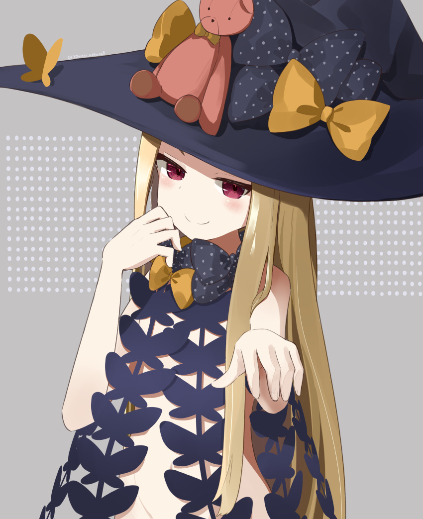 1girl abigail_williams_(fate/grand_order) absurdres black_headwear blonde_hair bow commentary_request fate/grand_order fate_(series) flat_chest hand_to_own_mouth hat highres long_hair outstretched_hand red_eyes revealing_clothes ribbon smile solo stuffed_animal stuffed_toy teddy_bear upper_body very_long_hair witch_hat yomogi_uehara