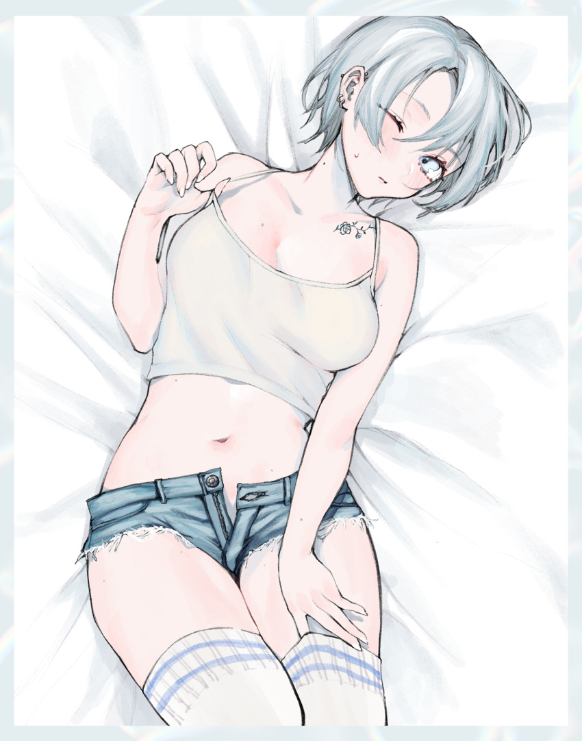 1girl absurdres bare_arms bare_shoulders bed_sheet blue_eyes breasts camisole closed_mouth collarbone cutoffs denim denim_shorts ear_piercing from_above highres looking_at_viewer lying medium_breasts mole mole_on_neck navel on_back one_eye_closed open_clothes open_fly open_shorts original piercing short_hair short_shorts shorts silver_hair solo stomach strap_lift sweat tattoo thigh-highs unbuttoned uni_(melm) white_legwear