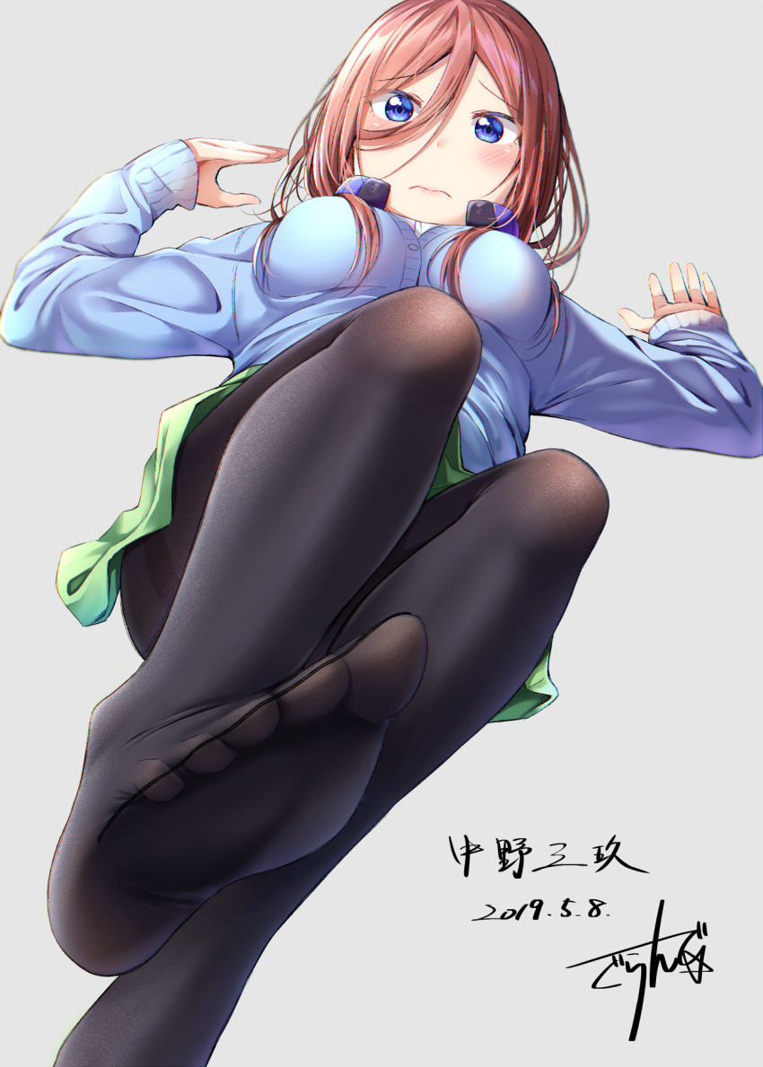 1girl bangs black_legwear blue_cardigan blue_eyes blush breasts brown_hair cardigan closed_mouth commentary_request dated dress_shirt eyebrows_visible_through_hair feet go-toubun_no_hanayome green_skirt grey_background gurande_(g-size) hair_between_eyes hands_up headphones headphones_around_neck highres leg_up legs long_hair long_sleeves looking_at_viewer lying medium_breasts nakano_miku no_shoes on_back pantyhose pleated_skirt shirt signature simple_background skirt sleeves_past_wrists soles solo thighband_pantyhose white_shirt