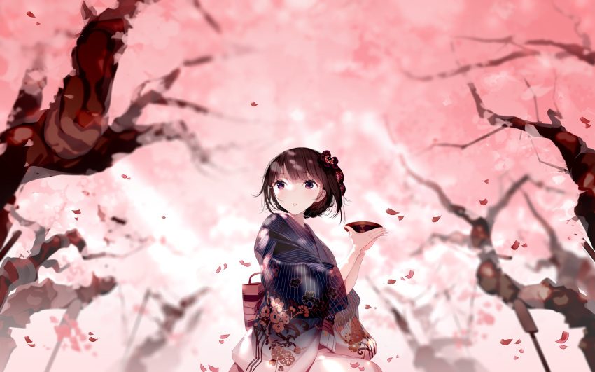 1girl atha_(leejuiping) bangs blue_kimono blurry blurry_background blush brown_hair cherry_blossoms commentary_request cup depth_of_field eyebrows_visible_through_hair floral_print flower hair_between_eyes hands_up highres holding holding_cup japanese_clothes kimono obi original parted_lips pink_flower print_kimono sakazuki sash short_sleeves solo striped tree vertical-striped_kimono vertical_stripes violet_eyes wide_sleeves