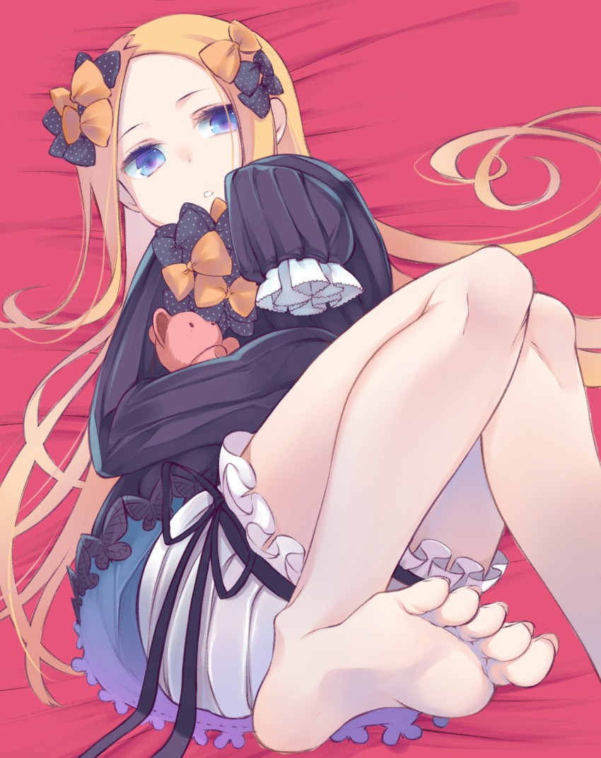 1girl abigail_williams_(fate/grand_order) bangs barefoot bed_sheet black_bow black_dress blonde_hair bloomers blue_eyes bow bug butterfly commentary_request dress fate/grand_order fate_(series) feet hair_bow hand_up highres insect karu_a_miruku legs long_hair long_sleeves lying no_hat no_headwear object_hug on_back orange_bow parted_bangs parted_lips polka_dot polka_dot_bow sleeves_past_fingers sleeves_past_wrists soles solo stuffed_animal stuffed_toy teddy_bear toenails toes underwear very_long_hair white_bloomers
