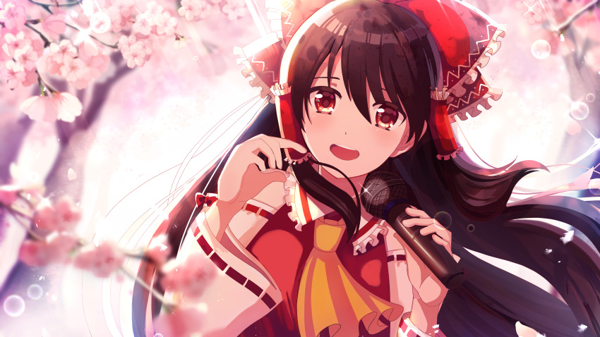 1girl :d absurdres bow brown_hair cherry_blossoms detached_sleeves floating_hair frilled_bow frills gujnwpnta hair_between_eyes hair_bow hair_tubes hakurei_reimu highres holding holding_microphone lens_flare long_hair long_sleeves looking_at_viewer microphone open_mouth print_bow red_bow red_eyes red_shirt ribbon-trimmed_sleeves ribbon_trim shiny shiny_hair shirt sleeveless sleeveless_shirt smile solo touhou upper_body very_long_hair white_sleeves yellow_neckwear