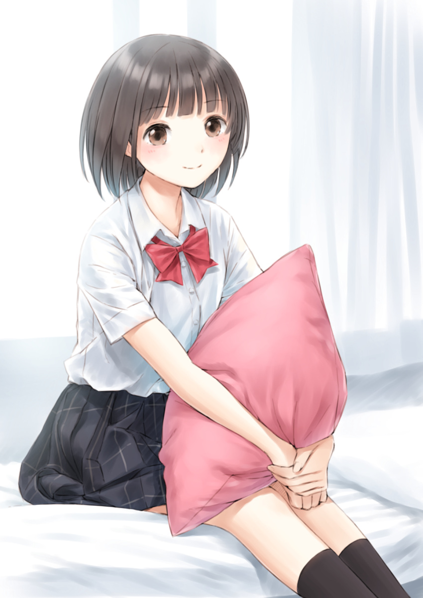 1girl bangs bashosho bed_sheet black_legwear black_skirt bow brown_eyes brown_hair closed_mouth collared_shirt commentary_request curtains dress_shirt eyebrows_visible_through_hair feet_out_of_frame highres indoors looking_at_viewer original pillow pillow_hug red_bow school_uniform shirt sitting skirt smile socks solo white_shirt