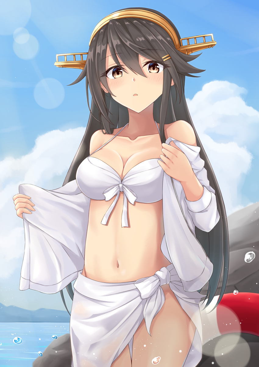 1girl :o absurdres alternate_costume bare_shoulders bikini black_hair blue_sky blurry blush bokeh breasts brown_eyes clouds commentary_request cowboy_shot day depth_of_field gensoukitan hair_ornament hairband hairclip haruna_(kantai_collection) headgear highres kantai_collection large_breasts lifebuoy light_particles long_hair looking_at_viewer navel open_mouth outdoors remodel_(kantai_collection) sarong sky solo stomach sunlight swimsuit white_bikini