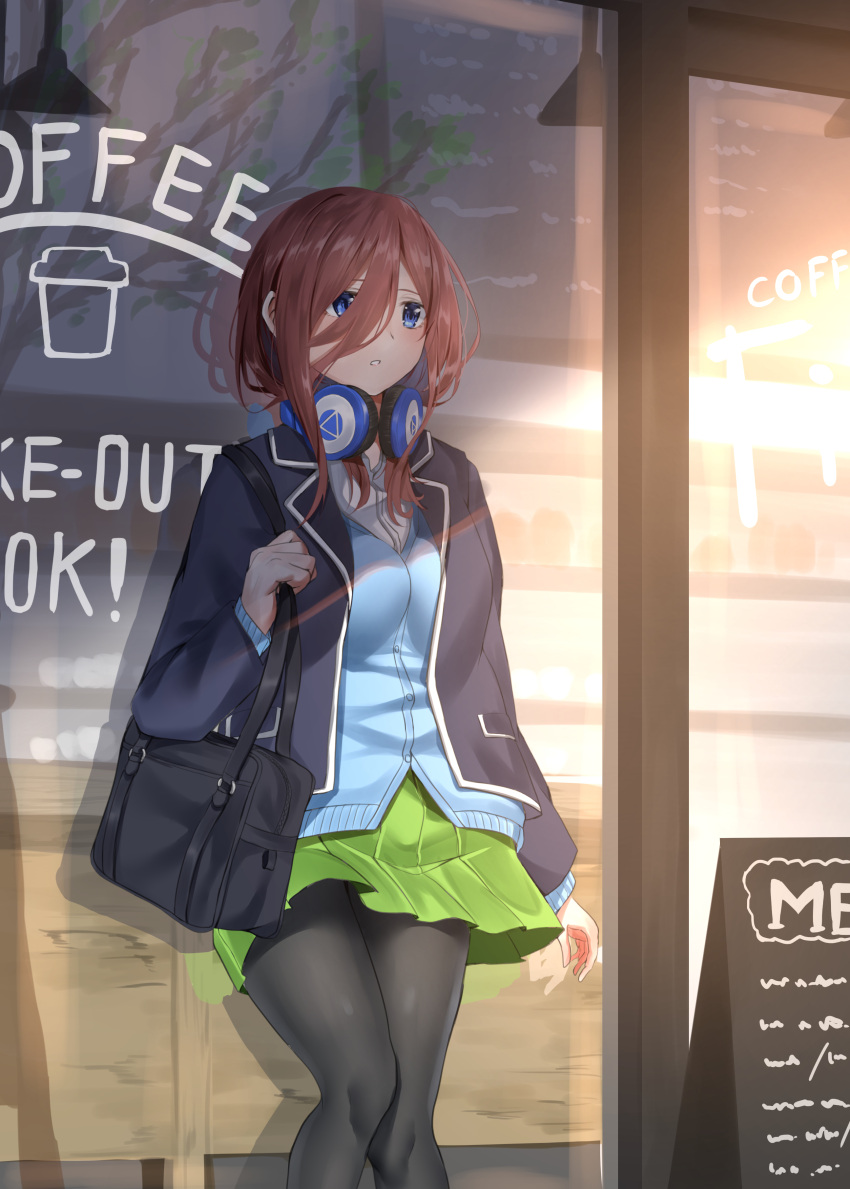 1girl absurdres bag bangs black_legwear blue_cardigan blue_eyes brown_hair cardigan coffee coffee_cup cup disposable_cup go-toubun_no_hanayome green_skirt hair_between_eyes headphones headphones_around_neck highres long_hair long_sleeves nakano_miku outdoors pantyhose pleated_skirt school_bag skirt storefront takenoko_27074918