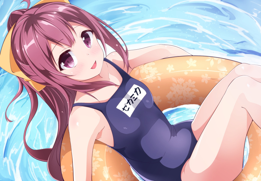 1girl acchii_(akina) alternate_costume bangs bare_shoulders blush bow breasts collarbone commentary_request day eyebrows_visible_through_hair floral_print hair_between_eyes hair_bow innertube kamikaze_(kantai_collection) kantai_collection long_hair looking_at_viewer name_tag navel one-piece_swimsuit open_mouth outdoors purple_hair ribbon small_breasts smile solo swimsuit violet_eyes water yellow_ribbon