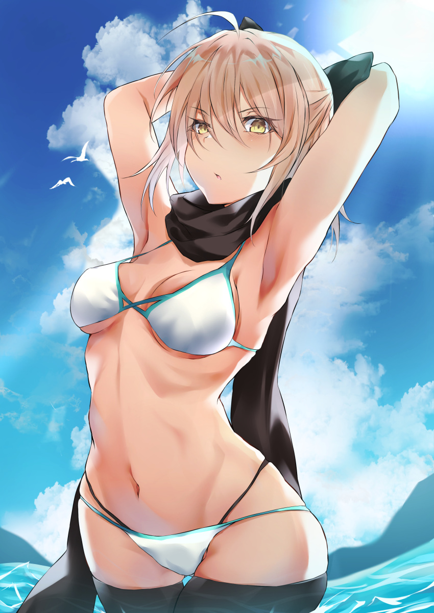 1girl absurdres ahoge alternate_costume armpits arms_up bikini bird black_bow black_scarf blonde_hair blue_sky bow breasts cowboy_shot day fate/grand_order fate_(series) half_updo highres looking_at_viewer navel okita_souji_(fate) okita_souji_(fate)_(all) outdoors scarf seagull sidelocks sky small_breasts solo swimsuit wading water white_bikini yellow_eyes yuki_maccha_(yukimattya10)