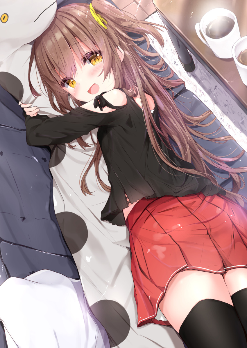 1girl :d ass bangs bare_shoulders black_legwear black_shirt blush brown_eyes brown_hair coffee coffee_mug commentary_request couch cup eyebrows_visible_through_hair hair_between_eyes hair_ribbon highres indoors kouda_suzu long_hair long_sleeves lying mug on_couch on_side one_side_up open_mouth original pillow pillow_hug pleated_skirt red_skirt ribbon shirt shoulder_cutout skirt smile solo steam table thigh-highs very_long_hair yellow_ribbon