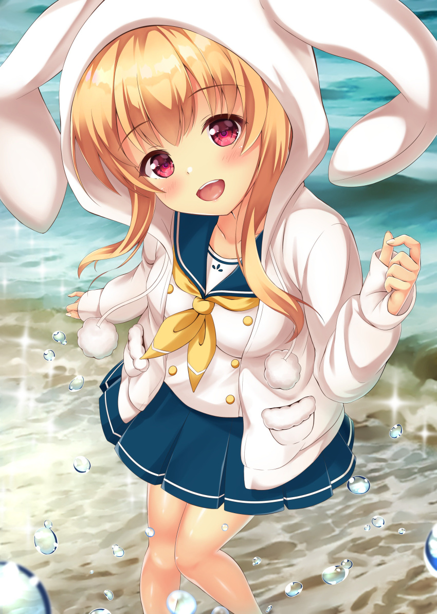 1girl :d absurdres animal_hood bangs battle_girl_high_school beach blonde_hair blush breasts bubble bunny_hood day eyebrows_visible_through_hair from_above head_tilt highres hood knees_together_feet_apart long_sleeves looking_at_viewer medium_breasts neckerchief ocean open_mouth outdoors pinching_sleeves pleated_skirt pom_pom_(clothes) red_eyes sand school_uniform serafuku sidelocks skirt smile solo sparkle watagi_michelle water_drop yellow_neckwear yuririn_poi
