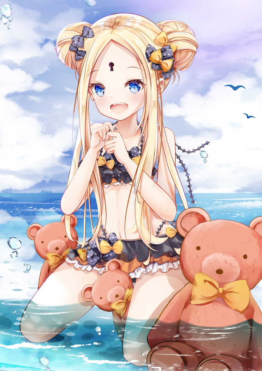 1girl :d abigail_williams_(fate/grand_order) bangs bare_arms bare_shoulders bikini black_bikini black_bow blonde_hair blue_eyes blue_sky blush bow clouds cloudy_sky collarbone commentary_request day double_bun emerald_float eyebrows_visible_through_hair fang fate/grand_order fate_(series) forehead full_body hair_bow hands_up highres holding holding_key horizon key keyhole kneeling long_hair looking_at_viewer mutang ocean open_mouth orange_bow outdoors parted_bangs polka_dot polka_dot_bow sidelocks sky smile solo stuffed_animal stuffed_toy swimsuit teddy_bear very_long_hair water