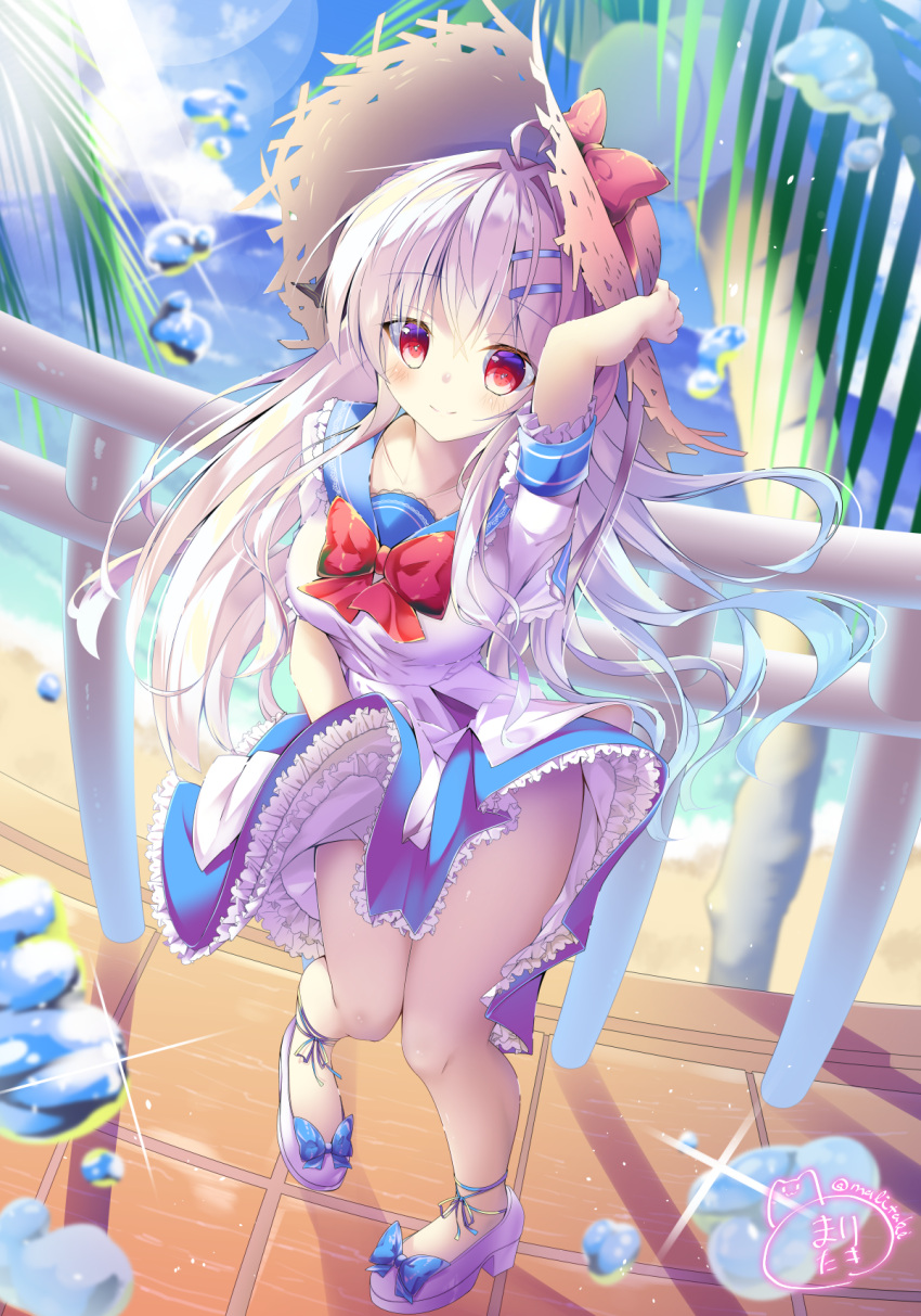 1girl ahoge alternate_costume artist_logo artist_name azur_lane bare_legs beach blouse blue_skirt blurry blurry_background blush bow bowtie breasts clouds cloudy_sky cygnet_(azur_lane) day droplet eyebrows_visible_through_hair frilled_skirt frills full_body glint hair_ornament hairclip hand_on_headwear hat hat_bow highres lens_flare long_hair looking_at_viewer maritaki medium_breasts ocean outdoors palm_tree platform_footwear railing red_eyes red_neckwear short_sleeves silver_hair skirt sky smile solo standing straw_hat sunlight thighs tree twitter_username water white_blouse white_footwear wind wind_lift