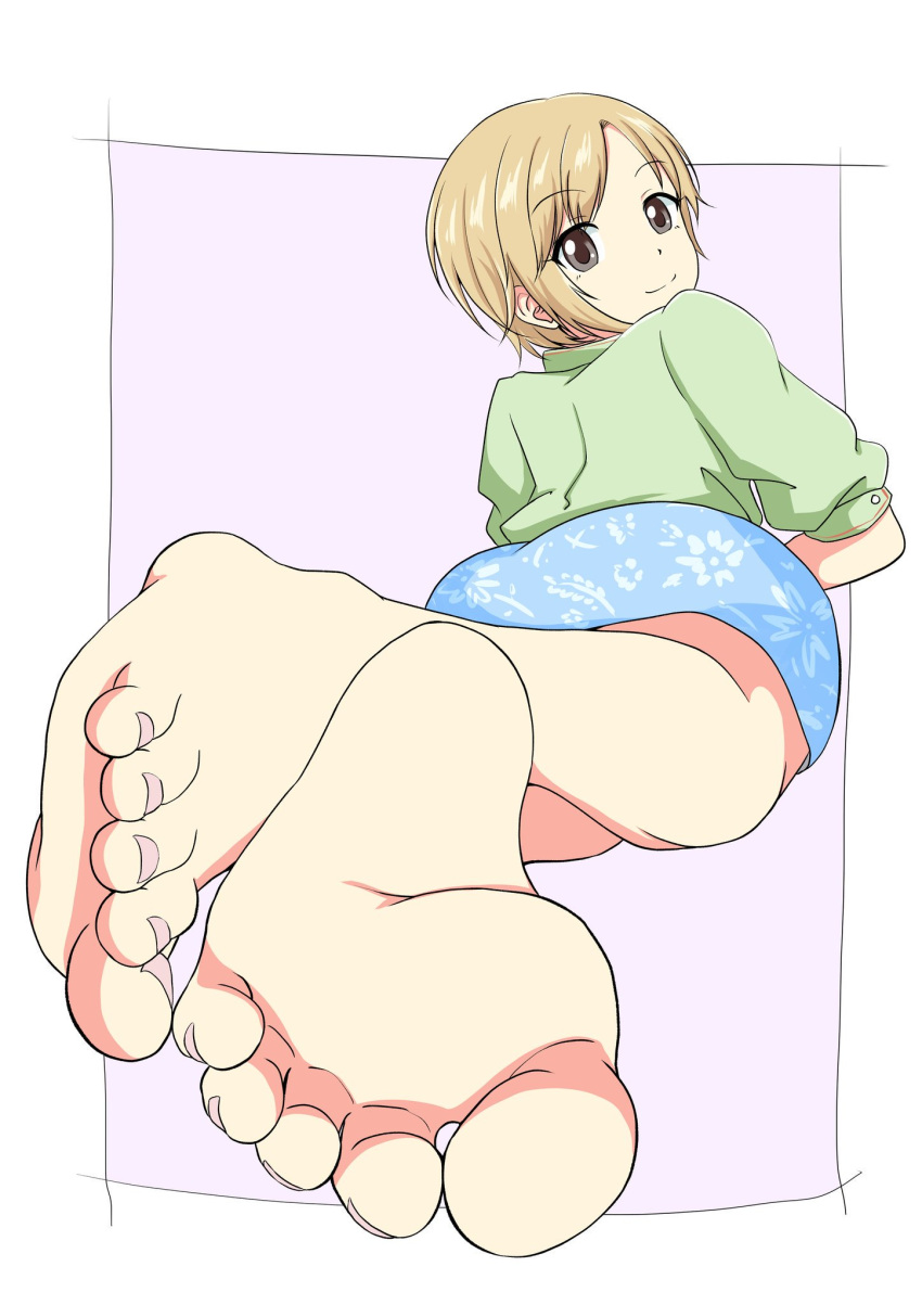 1girl aiba_yumi back barefoot blonde_hair brown_eyes eyebrows_visible_through_hair feet from_behind highres idolmaster idolmaster_cinderella_girls image_sample leafar looking_at_viewer looking_back lying on_stomach open_mouth pov_feet short_hair smile soles toes twitter_sample