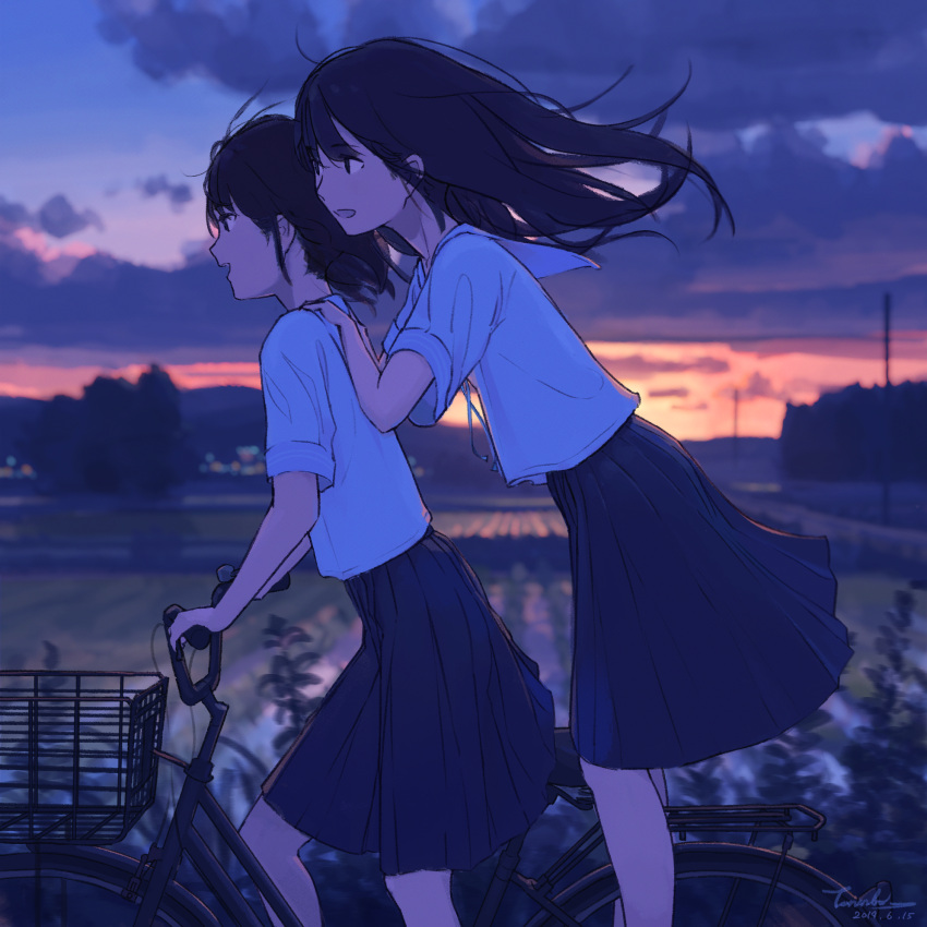 2girls backlighting bicycle bicycle_basket black_eyes black_hair blurry clouds cloudy_sky cruiser_bicycle dark dated depth_of_field ground_vehicle hands_on_another's_shoulders happy highres long_hair multiple_girls open_mouth original outdoors profile rice_paddy riding rural scenery school_uniform serafuku short_hair signature sketch sky standing sunset telephone_pole wind yakikoke