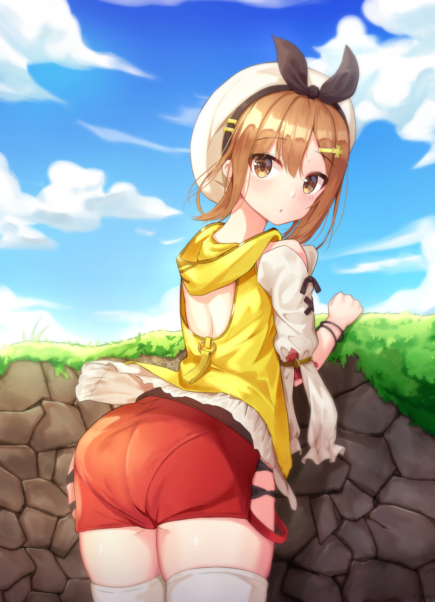 1girl :o ass atelier_(series) atelier_ryza backless_outfit bangle bangs beret black_ribbon blue_sky blush bracelet brown_eyes brown_hair clouds cloudy_sky commentary_request day eyebrows_visible_through_hair hair_between_eyes hair_ornament hair_ribbon hairclip hat highres hood hood_down hooded_jacket jacket jewelry leaning_forward looking_at_viewer looking_back open_clothes open_jacket outdoors parted_lips puffy_short_sleeves puffy_sleeves red_shorts reisalin_stout ribbon seero shirt short_shorts short_sleeves shorts skindentation sky sleeveless_jacket solo thigh-highs white_headwear white_legwear white_shirt yellow_jacket