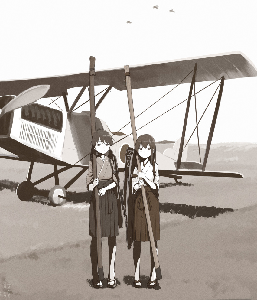 2girls absurdres aircraft airplane akagi_(kantai_collection) biplane commentary_request full_body hakama hakama_skirt highres houshou_(kantai_collection) japanese_clothes kantai_collection kawashina_(momen_silicon) kimono long_hair looking_at_viewer mitsubishi_1mf monochrome multiple_girls rigging sandals sepia smile wide_sleeves