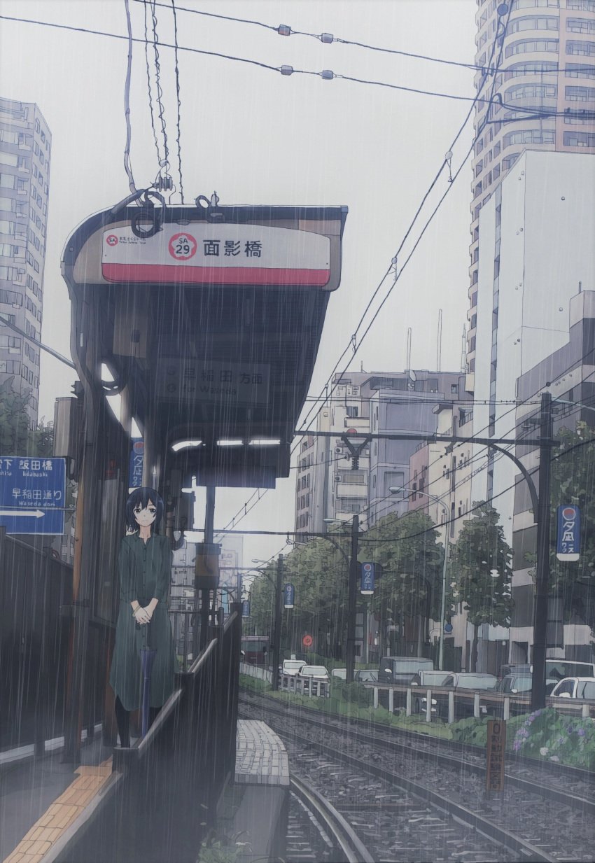 1girl black_eyes black_hair black_legwear blurry bracelet building car city clouds cloudy_sky depth_of_field dress ground_vehicle highres jewelry motor_vehicle muted_color original outdoors power_lines railing railroad_tracks rain real_world_location road scenery shinjuku short_hair sign sky solo street tokyo train_station tree truck umbrella unagi189