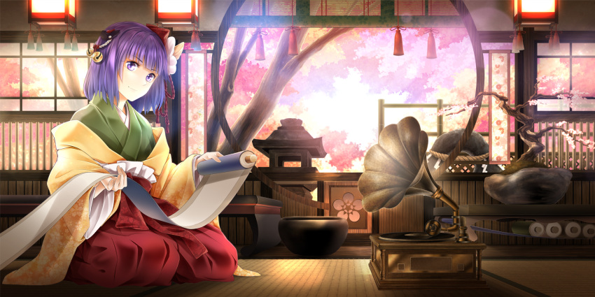 1girl arkatopia bangs bonsai cherry_blossoms commentary_request flower green_kimono hair_flower hair_ornament hakama hieda_no_akyuu highres holding_scroll indoors japanese_clothes kimono long_sleeves looking_at_viewer phonograph purple_hair red_hakama seiza short_hair sitting smile solo tatami touhou tree violet_eyes white_flower wide_sleeves yellow_kimono