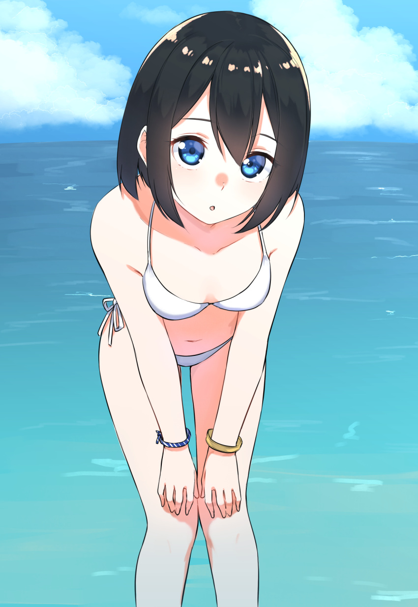 1girl :o bangle bangs bare_legs bare_shoulders bikini black_hair blue_eyes blue_sky bracelet breasts clouds cloudy_sky collarbone commentary_request day eyebrows_visible_through_hair feet_out_of_frame hair_between_eyes hands_on_own_thighs highres horizon jewelry leaning_forward looking_at_viewer navel ocean original outdoors parted_lips side-tie_bikini sky small_breasts solo standing suzunari_shizuku swimsuit water white_bikini yuki_arare