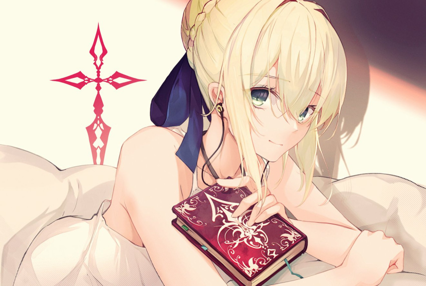 1girl ahoge artoria_pendragon_(all) bangs bare_shoulders blonde_hair blue_ribbon blush book braid breasts closed_mouth command_spell crown_braid dress earphones eyebrows_visible_through_hair fate/stay_night fate_(series) green_eyes hair_ribbon holding holding_book koo_emong long_hair looking_at_viewer lying on_stomach ribbon saber sidelocks smile solo under_covers white_dress