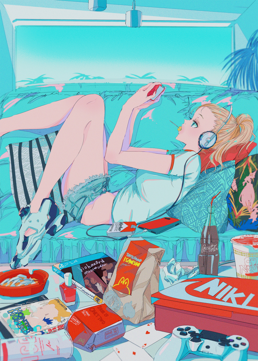 1girl ace_of_diamonds ace_of_hearts bag blonde_hair blue_eyes book brand_name_imitation candy card cellphone coca-cola commentary controller couch cushion denim denim_shorts english_commentary food fork from_side game_controller headphones highres hunter_x_hunter knees_up lollipop lying marlboro mcdonald's midriff mouth_hold nail_polish_bottle najuco_(naju0517) nike no_bangs on_back original paper_bag phone playing_card playing_games ponytail ramen resident_evil shoebox shoes short_shorts short_sleeves shorts smartphone soda_bottle solo used_tissue